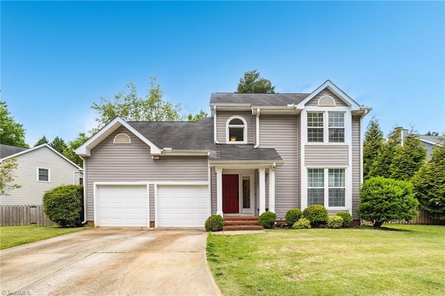 traditional home featuring concrete driveway and a garage