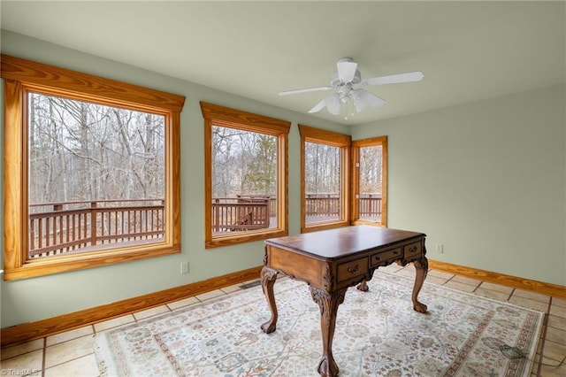 tiled office space with ceiling fan