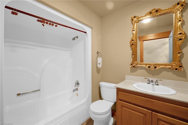 full bathroom with shower / tub combination, vanity, and toilet