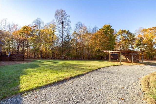 view of yard featuring a wooden deck