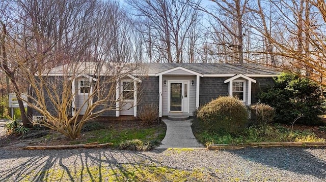 view of front of house featuring a shingled roof