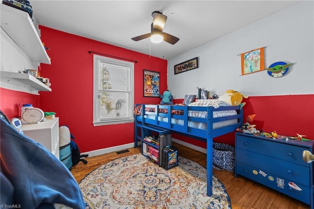 bedroom featuring ceiling fan and light hardwood / wood-style floors