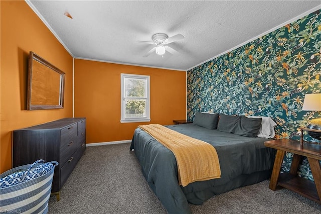 carpeted bedroom with ceiling fan, ornamental molding, and a textured ceiling