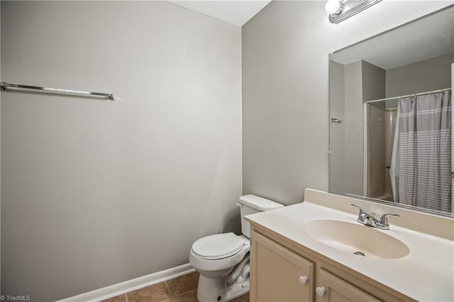 bathroom featuring vanity, toilet, tile patterned flooring, and a shower with shower curtain