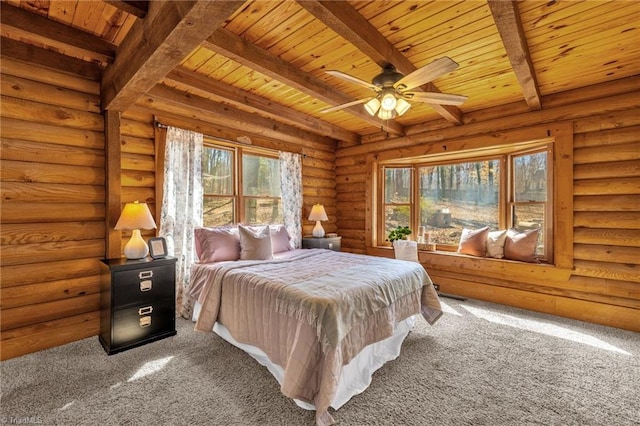 bedroom featuring beam ceiling, wood ceiling, log walls, and carpet floors