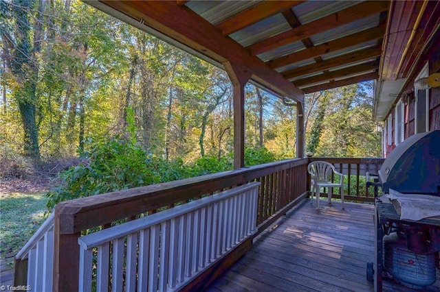 deck featuring a wooded view