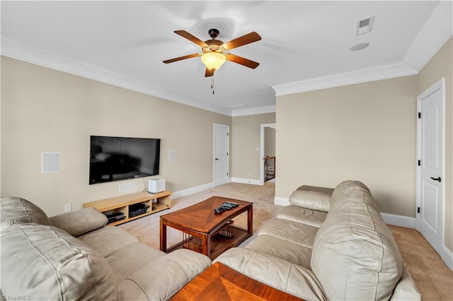 carpeted living room featuring ceiling fan and crown molding