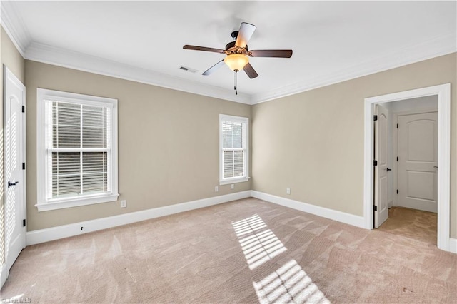 unfurnished bedroom with light carpet, a closet, ceiling fan, and ornamental molding