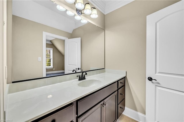 bathroom featuring vanity and ornamental molding