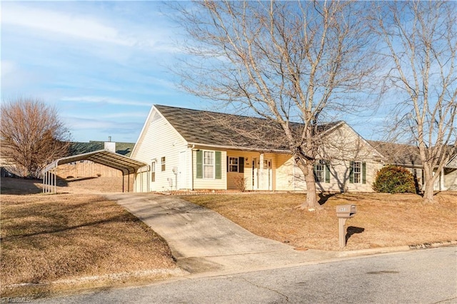 view of front of house with a carport