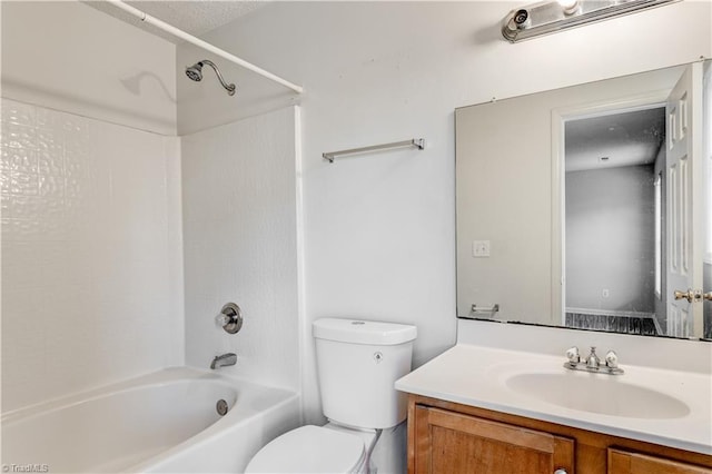 full bathroom with vanity, toilet, and bathtub / shower combination