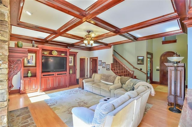 living room featuring light wood-type flooring, beam ceiling, ceiling fan, and coffered ceiling