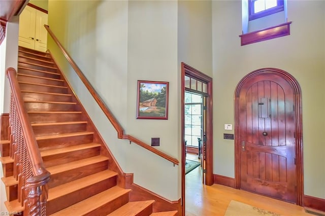 entryway featuring a high ceiling