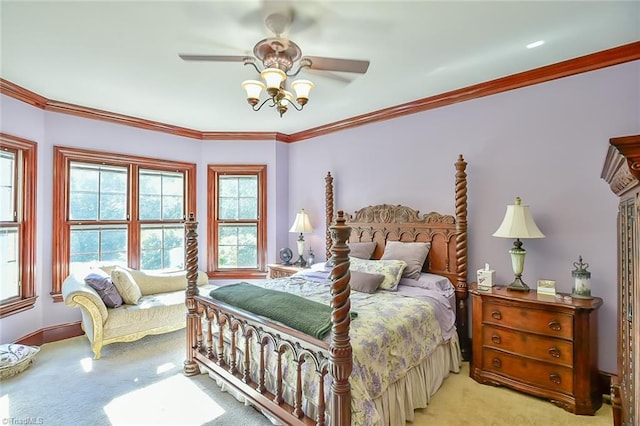 bedroom with ornamental molding, ceiling fan, and light carpet