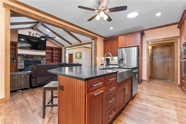 1420 Burnetts Chapel Rd, Greensboro, NC 27407 - kitchen featuring a sink, ceiling fan, a breakfast bar, stainless steel appliances, and recessed lighting