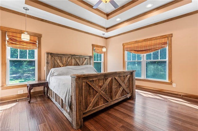 1420 Burnetts Chapel Rd, Greensboro, NC 27407 - bedroom with a raised ceiling, recessed lighting, dark wood-style flooring, ceiling fan, and crown molding