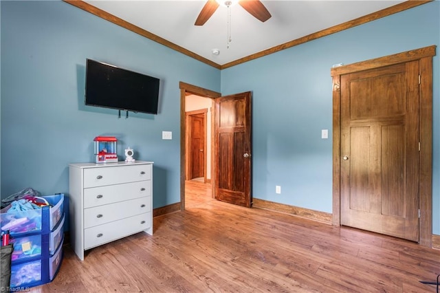 1420 Burnetts Chapel Rd, Greensboro, NC 27407 - bedroom with ornamental molding, wood finished floors, baseboards, and ceiling fan