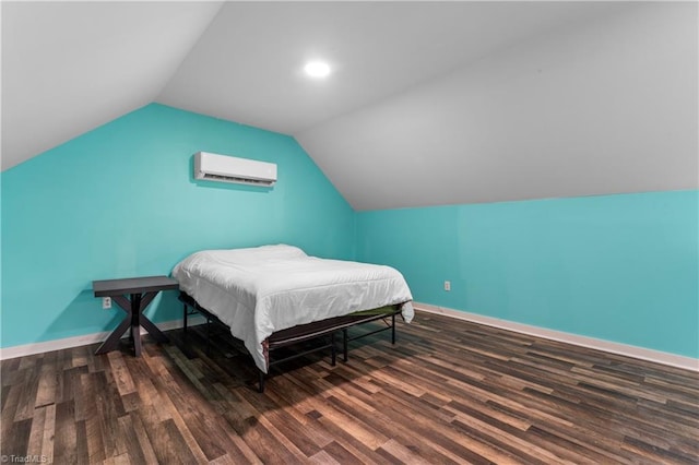 1420 Burnetts Chapel Rd, Greensboro, NC 27407 - bedroom featuring an AC wall unit, wood finished floors, baseboards, and vaulted ceiling