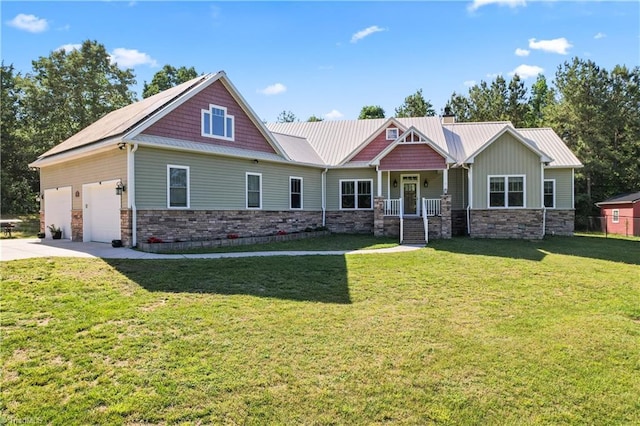 1420 Burnetts Chapel Rd, Greensboro, NC 27407 - craftsman house featuring stone siding, a porch, a front yard, a chimney, and driveway