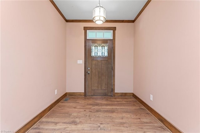 1420 Burnetts Chapel Rd, Greensboro, NC 27407 - foyer entrance with ornamental molding, baseboards, and wood finished floors