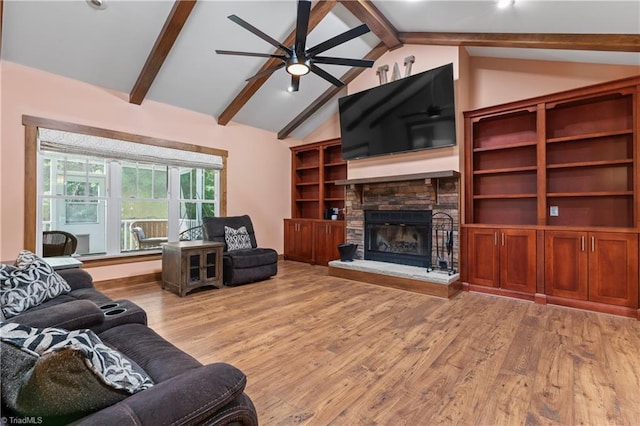 1420 Burnetts Chapel Rd, Greensboro, NC 27407 - living area featuring ceiling fan, wood finished floors, and a fireplace