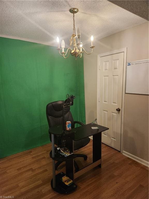 5517 Hornaday Rd Unit D, Greensboro, NC 27409 - office featuring dark wood-style floors, a chandelier, and a textured ceiling