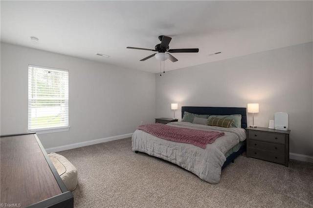 bedroom with visible vents, carpet flooring, ceiling fan, and baseboards