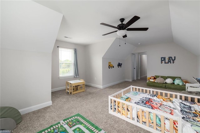 bedroom featuring carpet flooring, baseboards, a ceiling fan, and lofted ceiling