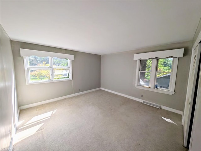 2841 Wesleyan Ln, Winston-Salem, NC 27106 - spare room with baseboards and carpet flooring