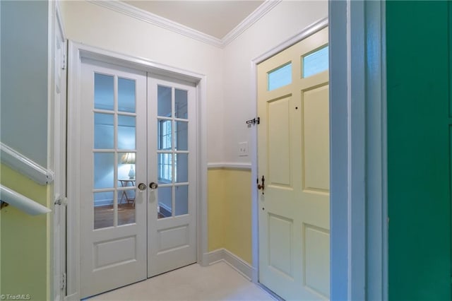 doorway featuring crown molding and french doors