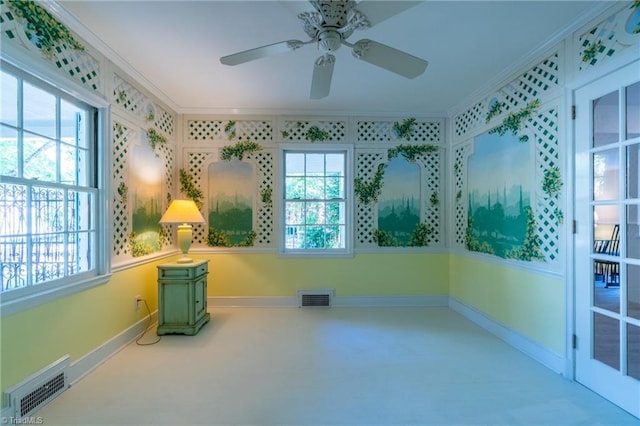 empty room with ornamental molding and carpet floors