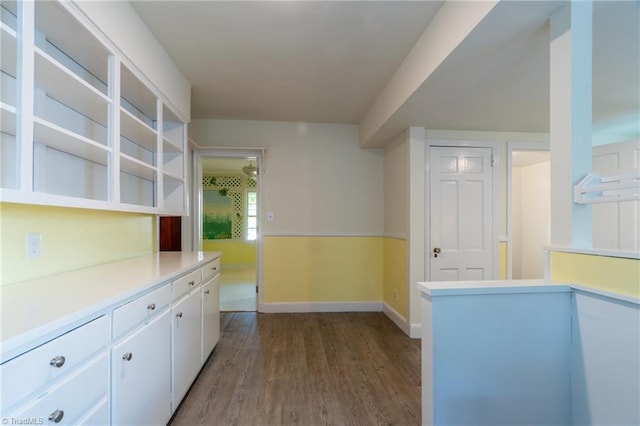 kitchen with white cabinets and light wood-type flooring