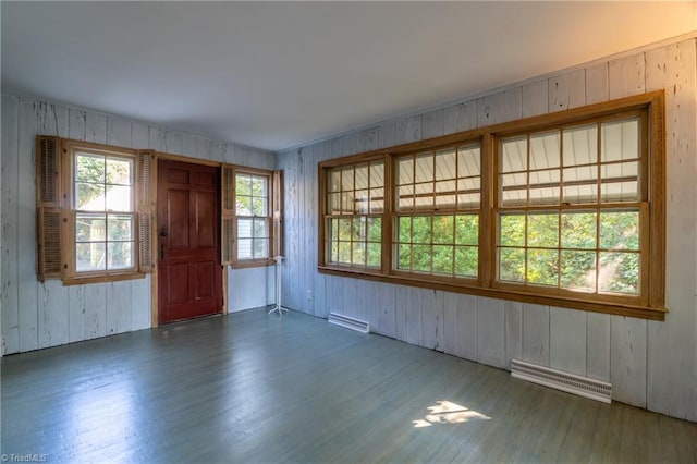 empty room featuring dark hardwood / wood-style flooring