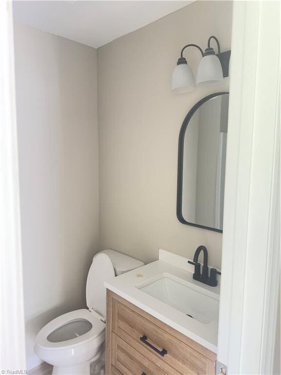 3109 Darden Rd Unit B, Greensboro, NC 27407 - half bathroom with vanity and toilet