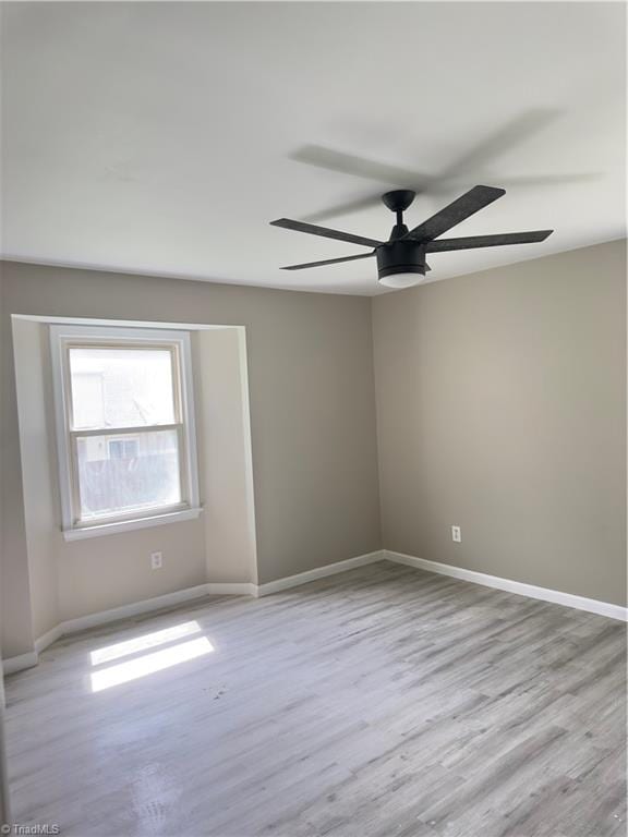 3109 Darden Rd Unit B, Greensboro, NC 27407 - unfurnished room featuring a ceiling fan and light wood-type flooring