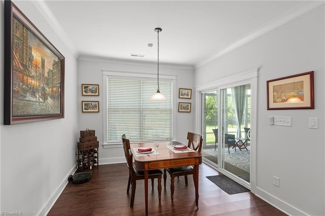 254 Kilbourne Dr, Advance, NC 27006 - dining area with dark wood-style floors and crown molding