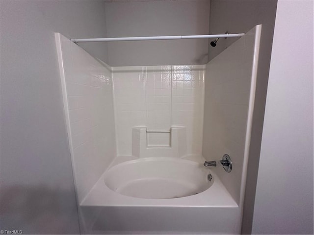 bathroom with shower / tub combination