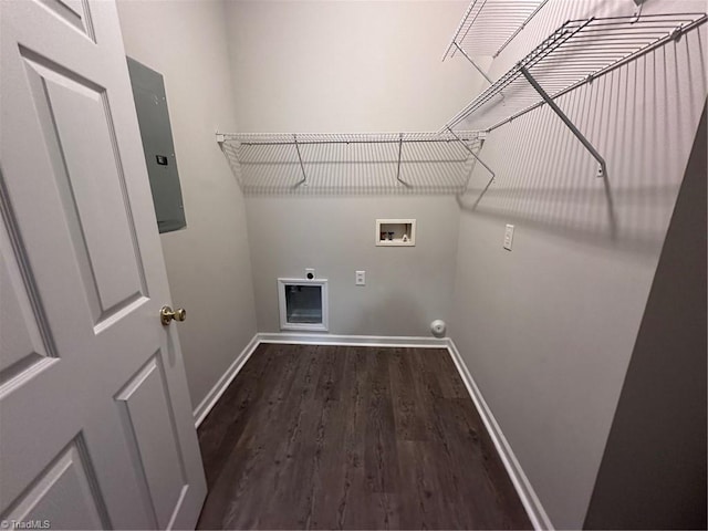 clothes washing area with electric dryer hookup, hookup for a washing machine, dark hardwood / wood-style flooring, and electric panel