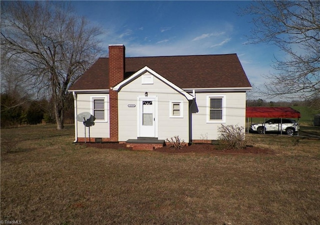 bungalow-style home with a chimney, roof with shingles, crawl space, and a front yard