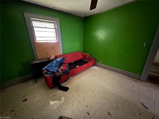 bedroom with baseboards and ceiling fan