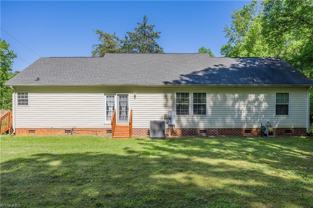 back of house with a lawn, central AC, crawl space, and entry steps