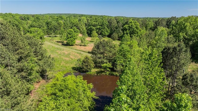 aerial view featuring a view of trees