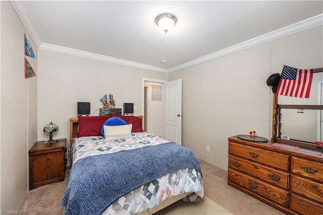 bedroom with a textured ceiling, ornamental molding, and carpet
