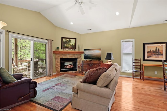 196 Evergreen Springs Ct Unit 602, Blowing Rock, NC 28605 - living area with vaulted ceiling, a ceiling fan, light wood-style floors, and a stone fireplace