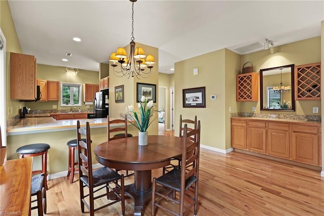 196 Evergreen Springs Ct Unit 602, Blowing Rock, NC 28605 - dining space with a chandelier, light wood-style flooring, recessed lighting, and baseboards