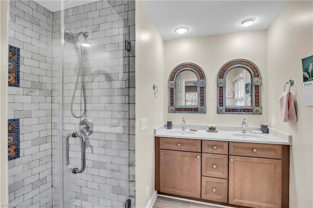 bathroom with vanity and walk in shower