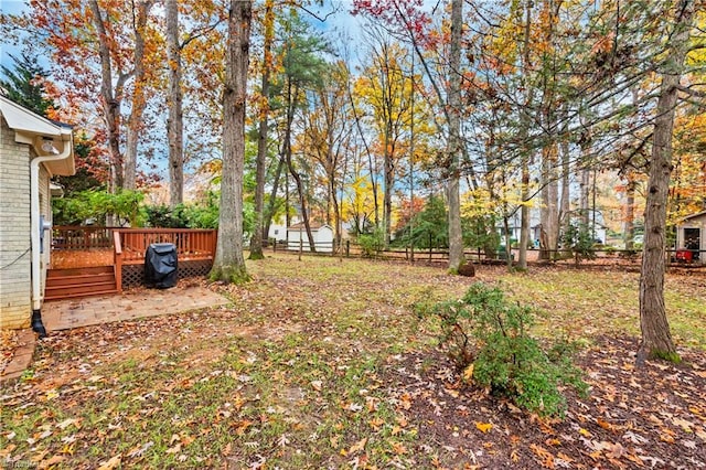 view of yard featuring a deck