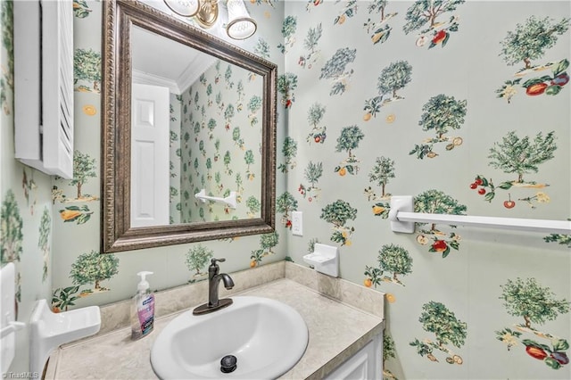 bathroom with vanity and crown molding