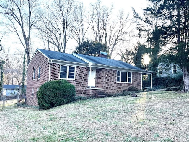 ranch-style home with a front yard