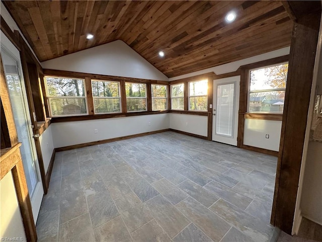 unfurnished sunroom featuring plenty of natural light, lofted ceiling, and wood ceiling